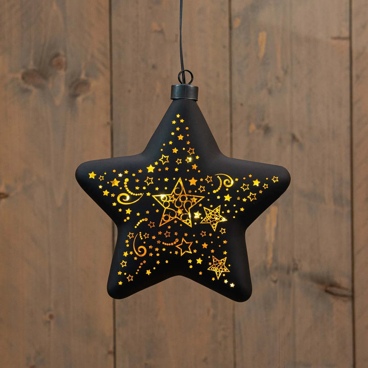 Elegant dekorstjerne - svart og gull med LED lys - Juletrepynt.no