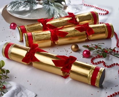 Julepynt smellbonbon i gull. Store med rød sløyfer og gaver