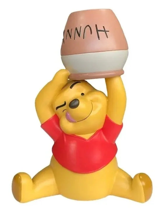 Ole Brum hagestatue - med hånda i krukken