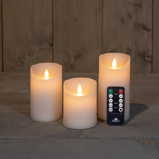 Hvite elektriske kubbelys - bevegelig LED flamme. - Juletrepynt.no